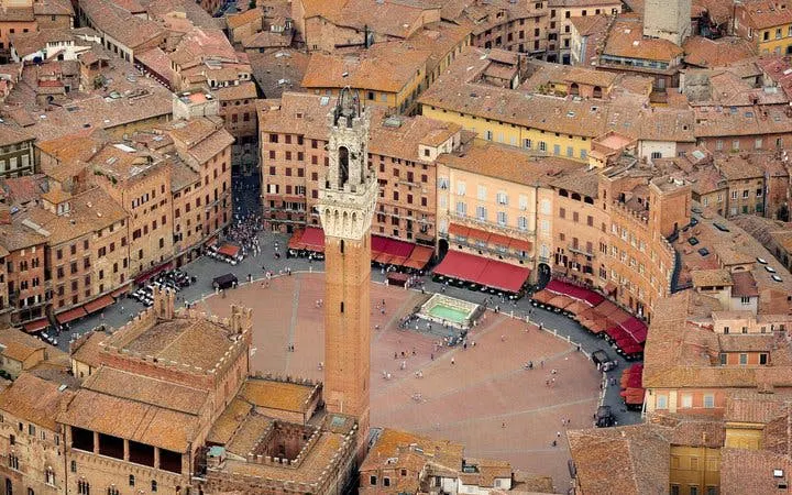 Siena's Piazza del Campo aerial view, featuring Torre del Mangia, part of self-guided walking tour.