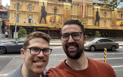 Melbourne theater with Hamilton banners, part of Ghosts of Melbourne city exploration game.