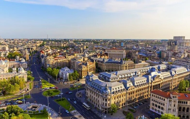 Bucharest cityscape with historic architecture, part of the Old Town exploration game.