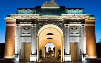Menin Gate illuminated at night, part of Flanders Fields WWI Remembrance Tour from Brussels.