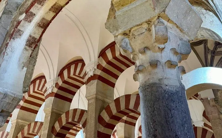 Arched columns inside the Mosque-Cathedral of Córdoba, Spain.