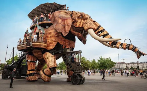 Giant mechanical elephant carrying people at Les Machines de l'île, Nantes.