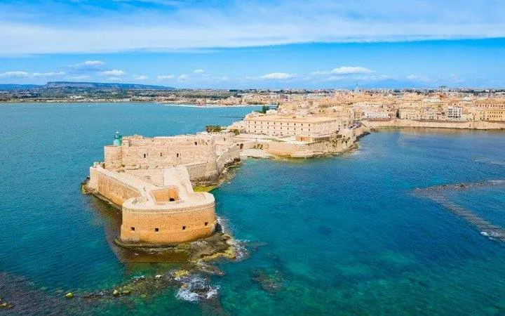 Aerial view of Maniace Castle on Ortigia Island, Siracusa, part of Syracuse self-guided walking tour.