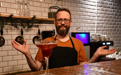 Local storyteller hosting Icelandic dinner at family-owned restaurant.