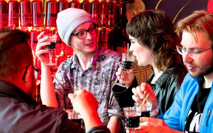 Group enjoying local drinks on Bratislava food tour.