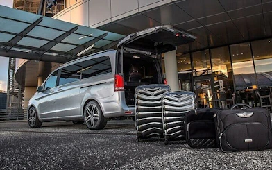 Van with open trunk and luggage for private transfer between Agadir and Marrakesh.