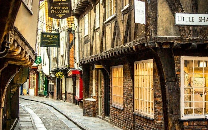 York's Shambles street with timber-framed buildings, part of Harry Potter walking tour.