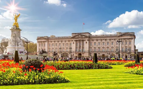 Buckingham Palace with Victoria Memorial, London, during Changing of the Guard tour.