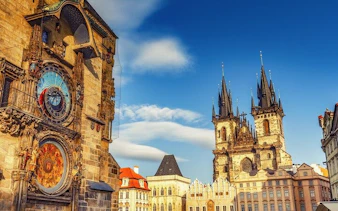 Astronomical Clock and Church of Our Lady before Týn in Prague's Old Town Square.