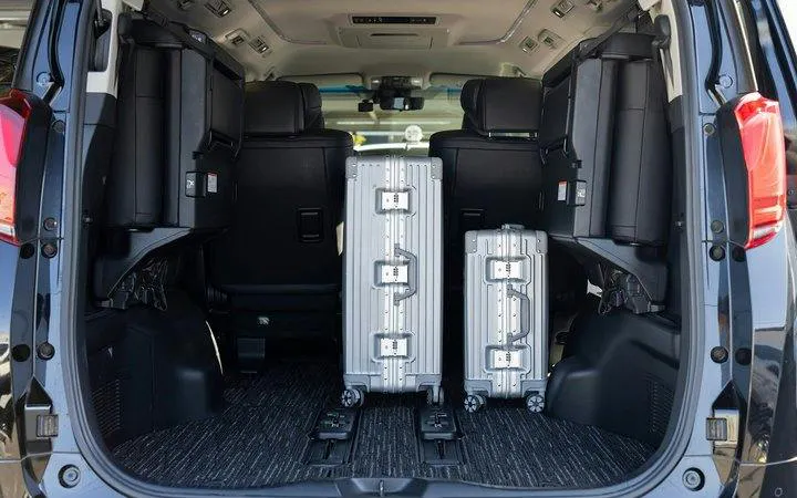 Luggage inside a spacious vehicle for Kyoto private charter with airport transfer.
