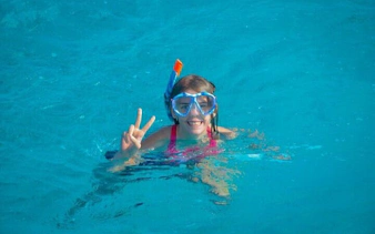 Snorkeler enjoying the water during a private speedboat ride in Sharm El Sheikh.