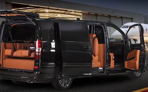 Modern black van with open doors at Istanbul airport for private transfer.