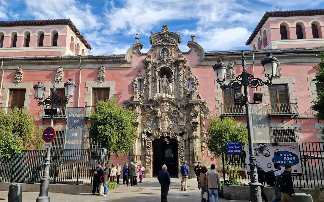 Museo de Historia de Madrid entrance with ornate Baroque facade, Madrid.