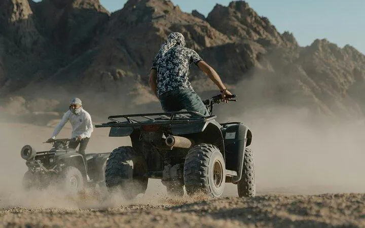 ATV riders exploring desert terrain in Sharm El Sheikh.