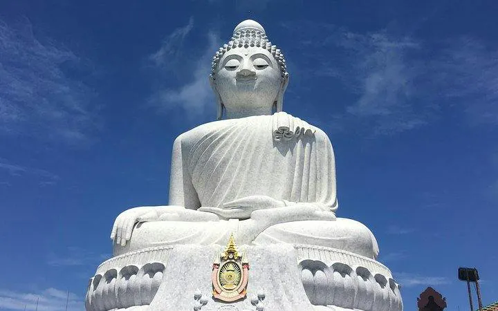 Big Buddha statue under blue sky, Phuket City Highlights tour.