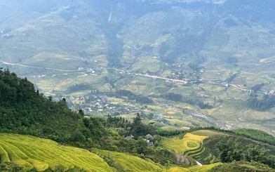 Rice terraces and village view in Sapa, Vietnam, part of a private 2-day car tour with homestay in Ta Van.