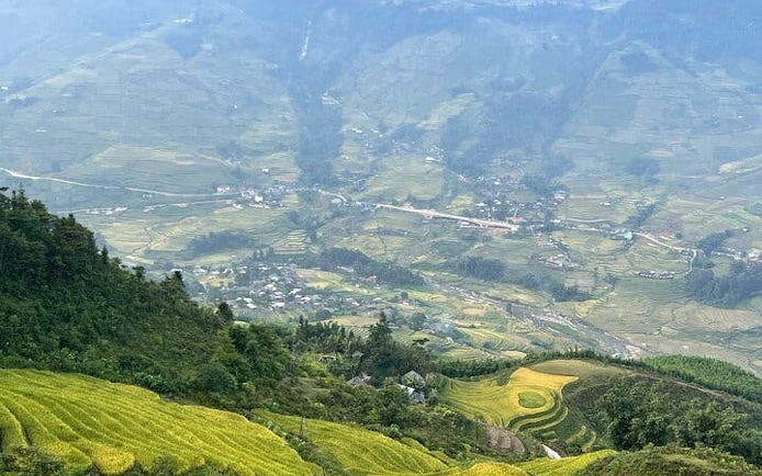 Rice terraces and village view in Sapa, Vietnam, part of a private 2-day car tour with homestay in Ta Van.