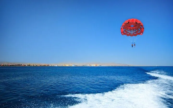 Parasailing over the Red Sea with a speedboat in Hurghada, Egypt.