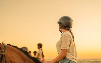 Horseback riding at sunset near the Red Sea in Hurghada.