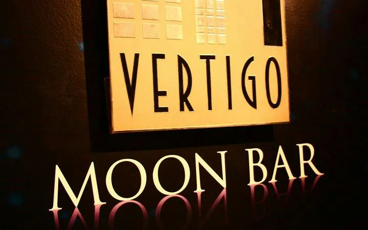Vertigo Moon Bar sign at Banyan Tree, Bangkok rooftop dining experience.