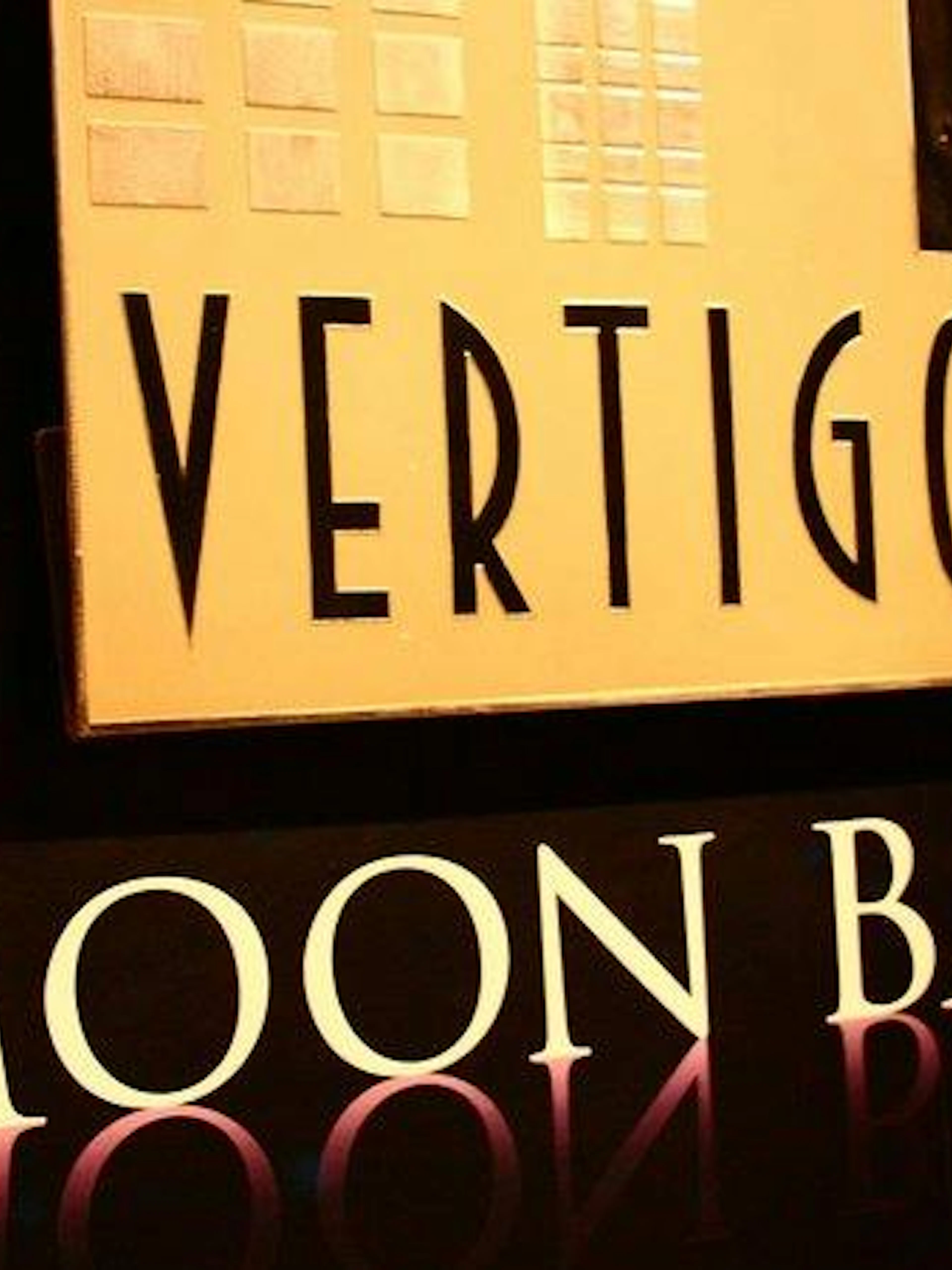 Vertigo Moon Bar sign at Banyan Tree, Bangkok rooftop dining experience.