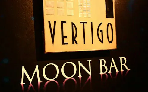 Vertigo Moon Bar sign at Banyan Tree, Bangkok rooftop dining experience.