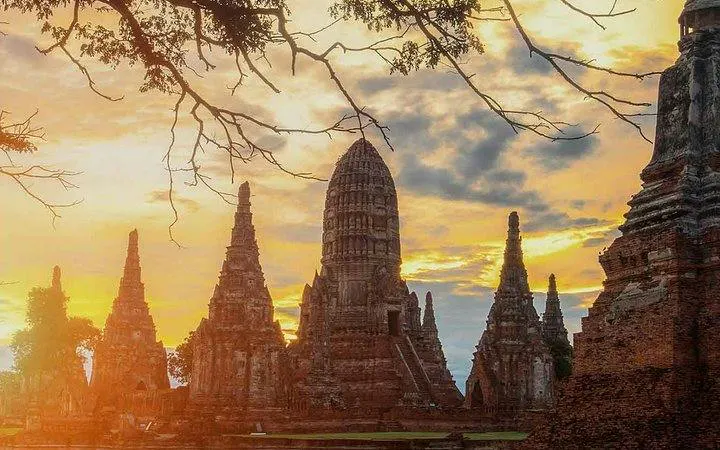 Ayutthaya temple ruins at sunset, part of UNESCO tour from Bangkok.