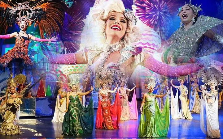 Performers in vibrant costumes at Tiffany's Cabaret Show, Pattaya.