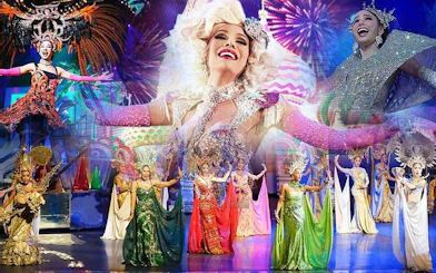 Performers in vibrant costumes at Tiffany's Cabaret Show, Pattaya.