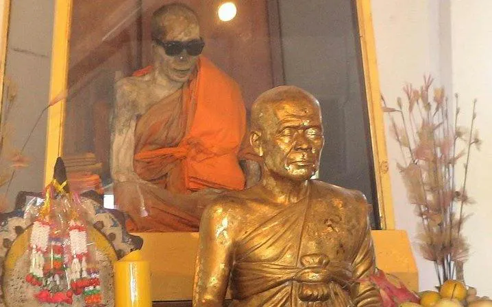 Mummified monk at Wat Khunaram temple, Koh Samui, part of the 4WD Jeep Safari Tour.