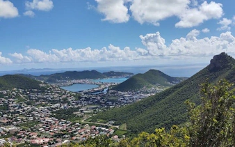 St. Maarten view from highest point hike with ocean and town below.