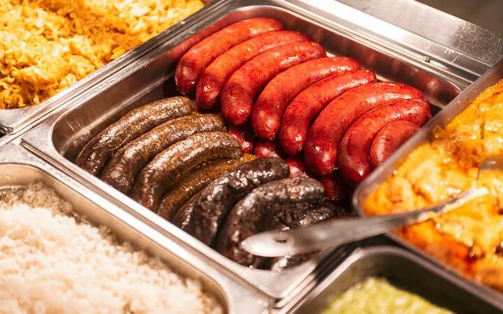 Sausages and traditional Hungarian dishes on display during Budapest food tour.