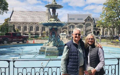 Couple in front of Peacock Fountain, Christchurch Botanic Gardens, during half-day city tour.