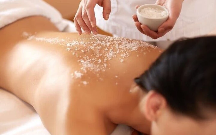 Hammam exfoliation treatment at 16th-century bathhouse in Marrakesh.