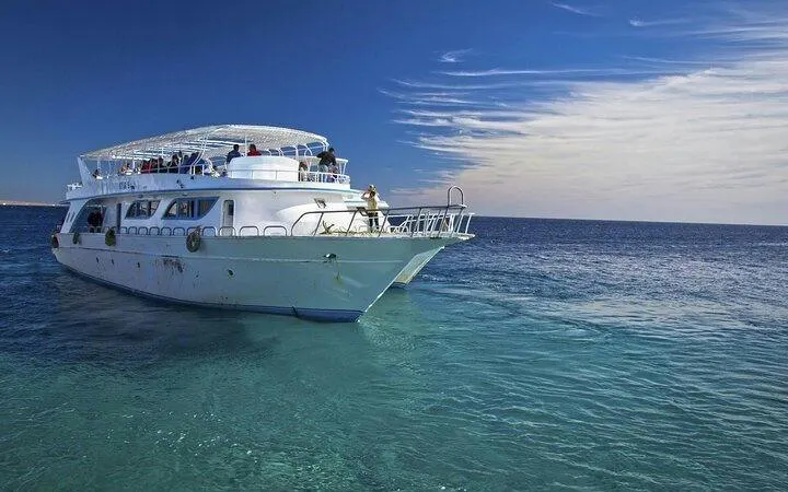 Boat on clear waters for scuba diving tour, Sharm El Sheikh.