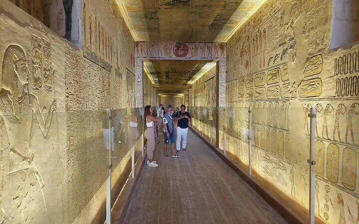 Ancient Egyptian hieroglyphs in Valley of the Kings corridor, Luxor day tour from Hurghada.