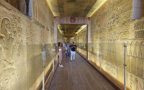 Ancient Egyptian hieroglyphs in Valley of the Kings corridor, Luxor day tour from Hurghada.