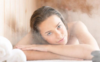 Person relaxing in a steam-filled Turkish bath, Sharm El Sheikh.