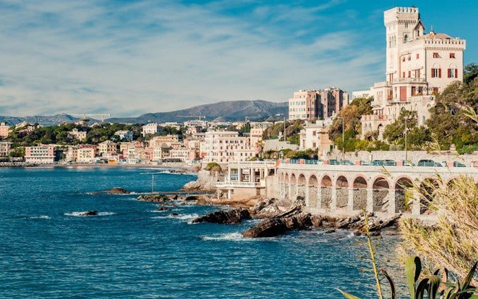 Genoa coastline with historic buildings and scenic views on a self-guided walking tour.