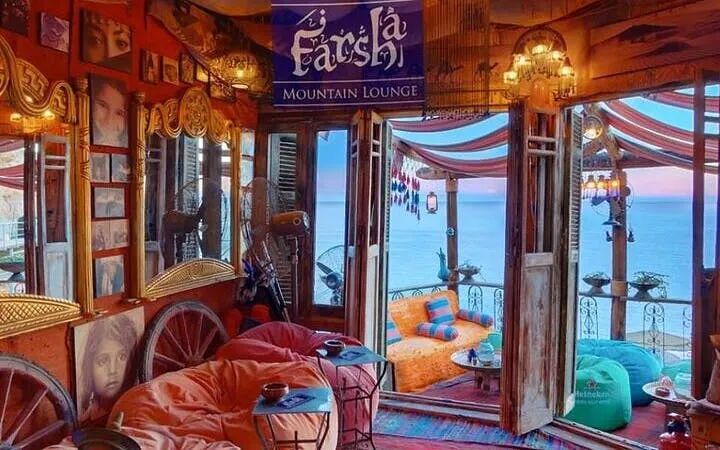 Luxurious seating area at Farsha Cafe with sea view in Sharm El Sheikh.