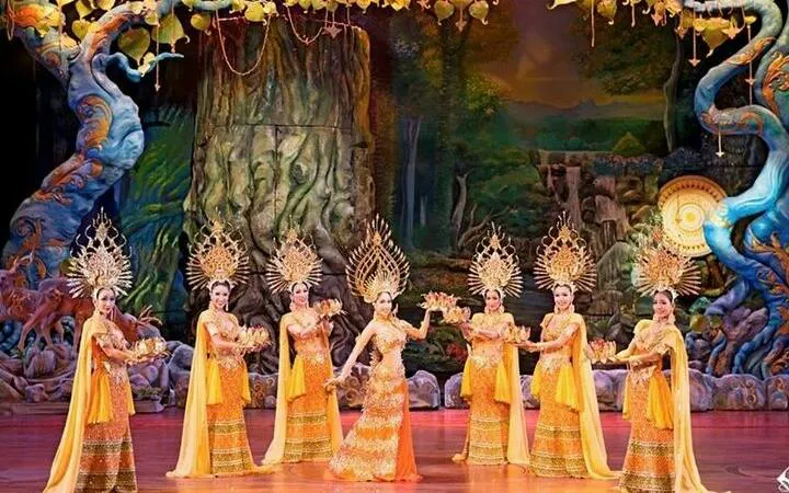 Performers in traditional costumes on stage at Alcazar Cabaret Show, Pattaya.