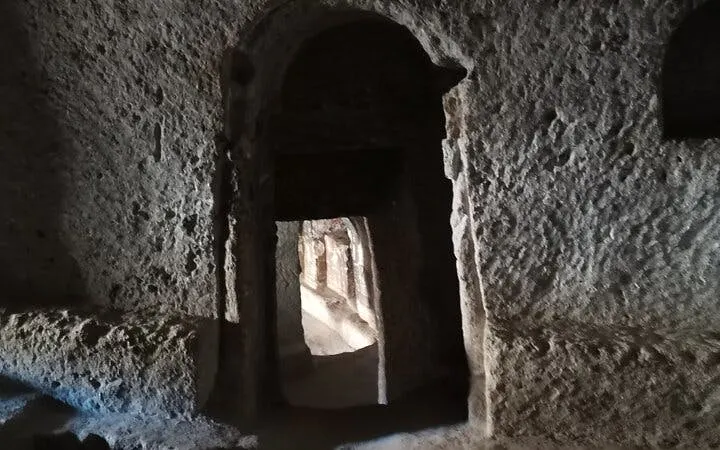 Ancient rock-cut passageway in Cappadocia, Turkey, part of a private tour with museum access.