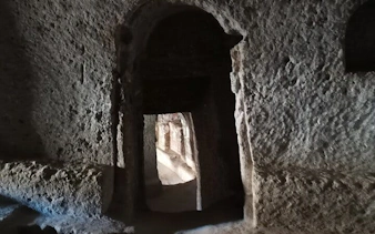 Ancient rock-cut passageway in Cappadocia, Turkey, part of a private tour with museum access.