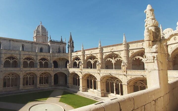 Jeronimos Monastery cloister in Belém, Lisbon, showcasing Gothic architecture.