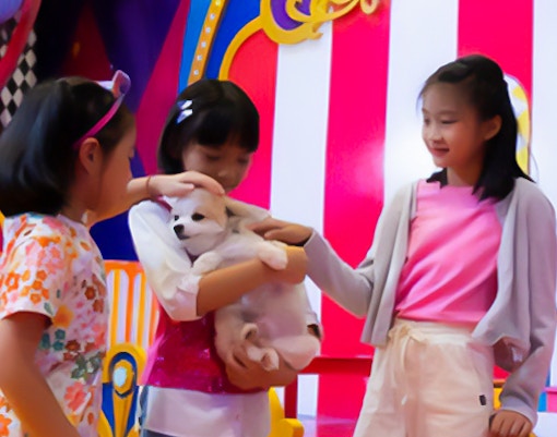 Carnival Magic Phuket parade with vibrant floats and performers in colorful costumes.