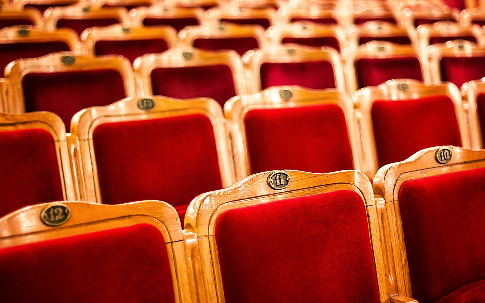 Radio City Music Hall exterior with illuminated marquee in New York City.