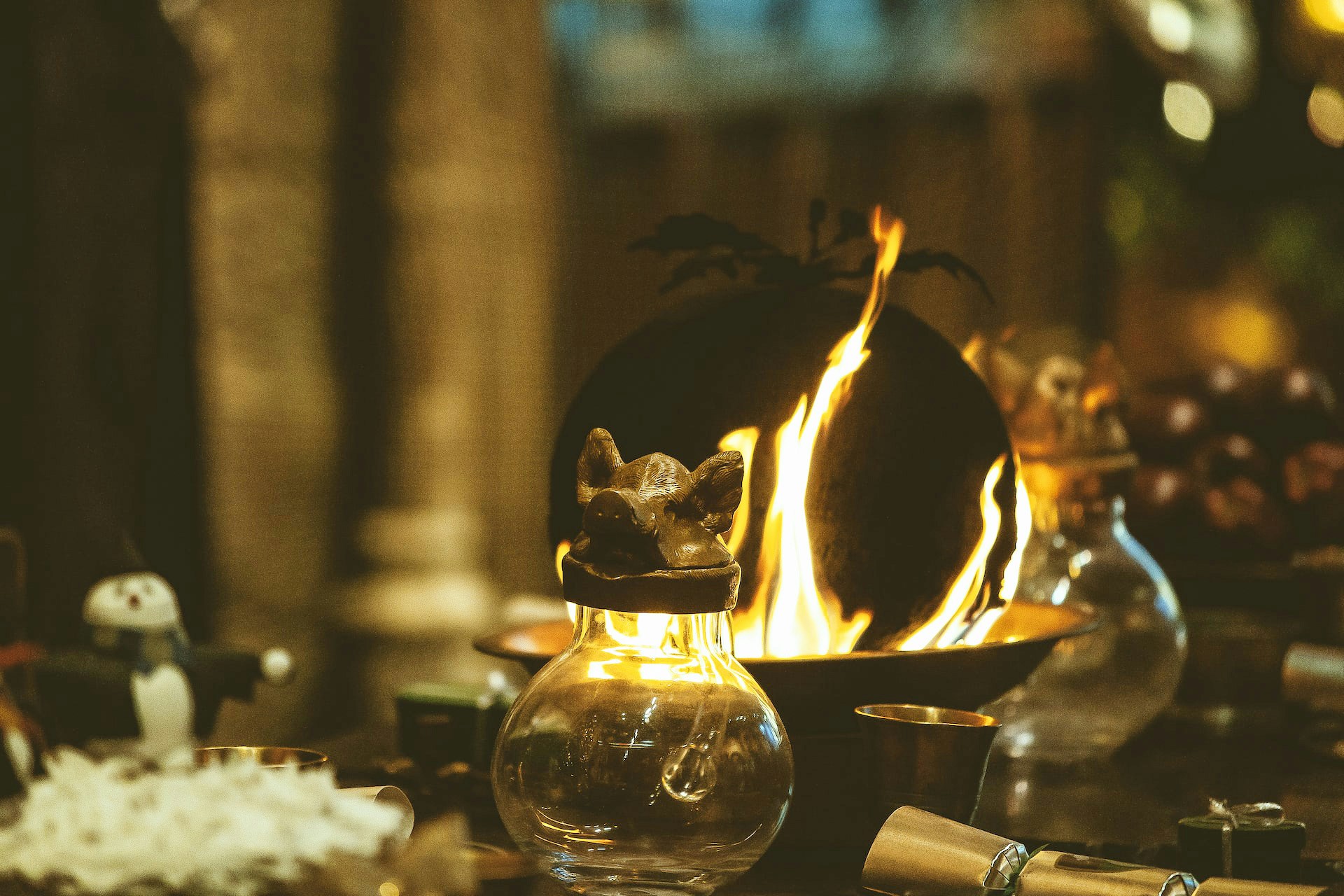 Cauldron with fire at Harry Potter Studio Tour, London.