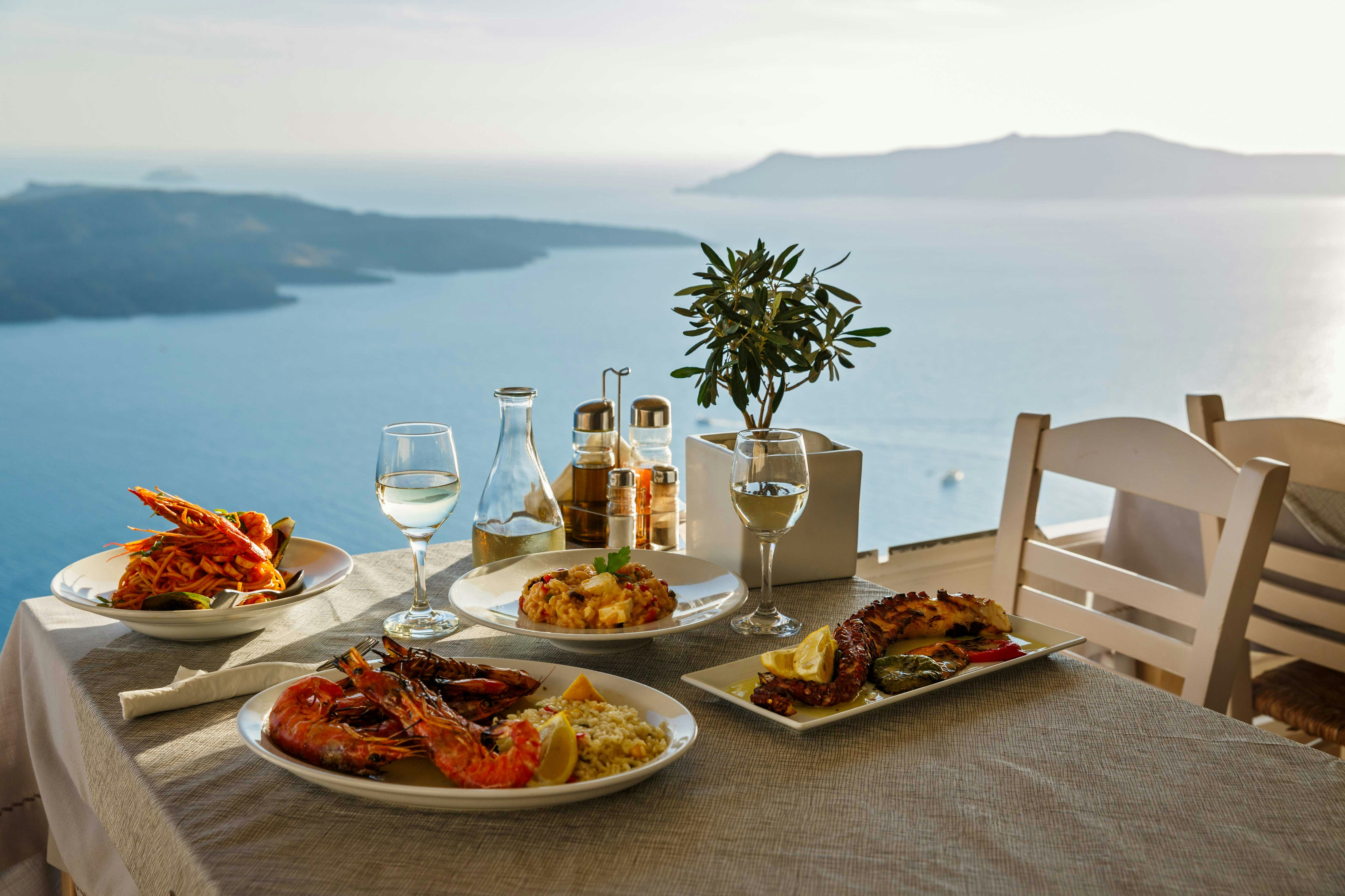 Mediterranean seafood dishes on a table overlooking the sea in Marseille