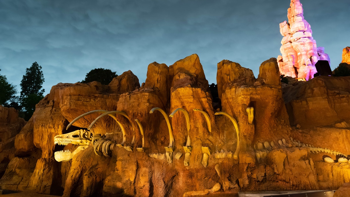 Big Thunder Mountain Railroad ride at Disneyland Paris during evening.