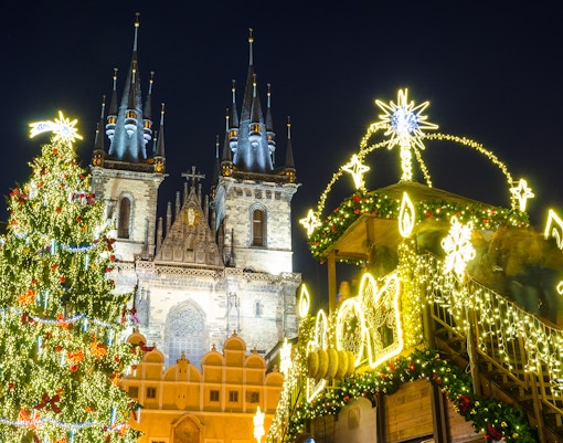 Christmas lights and decorated tree in front of Church of Our Lady before Týn, Prague.